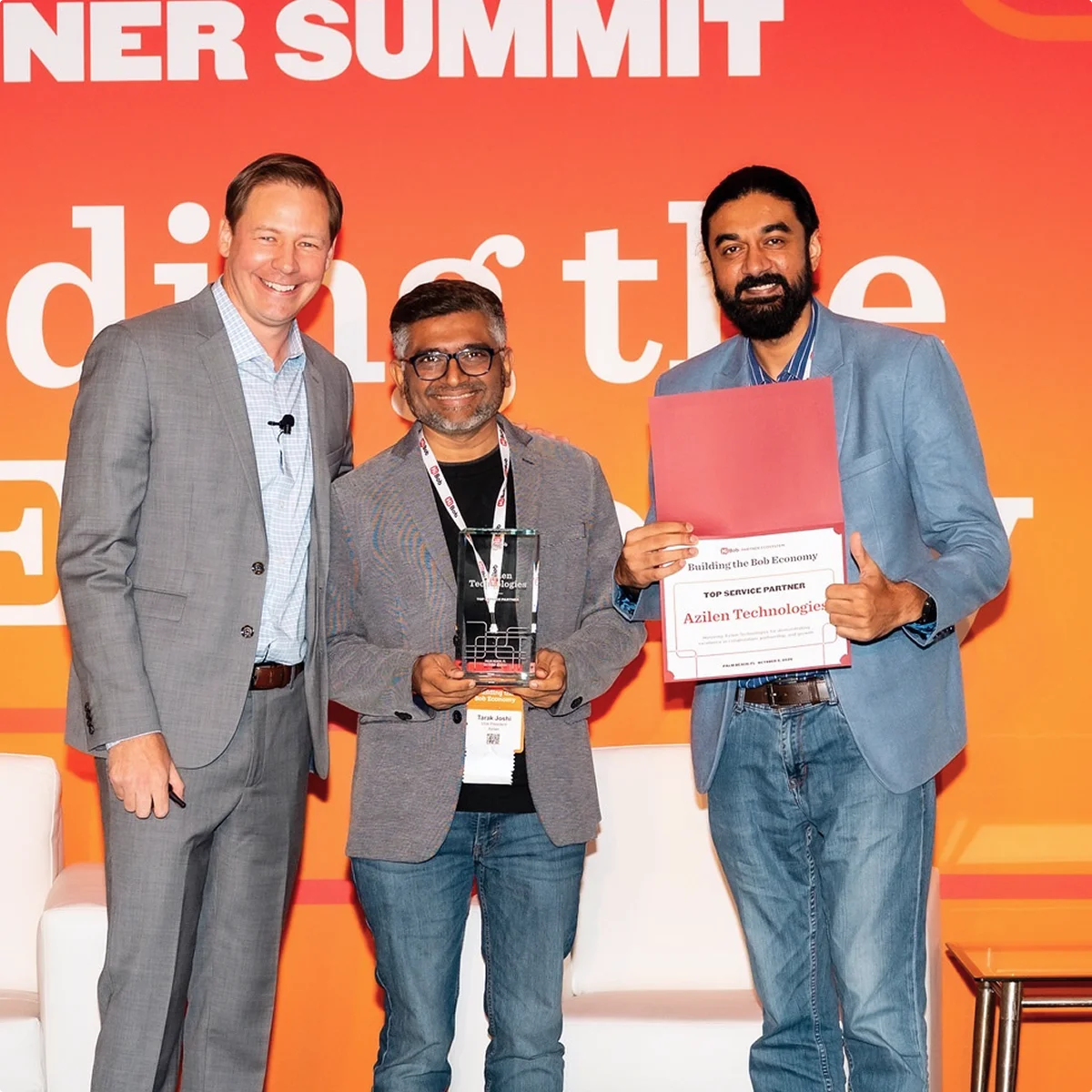 Azilen receiving the HiBob Top Service Partner award